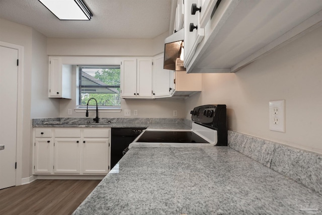 10104 Clearsound Dr, Pensacola, FL 32506 - kitchen featuring white cabinets, wood finished floors, and range with electric stovetop