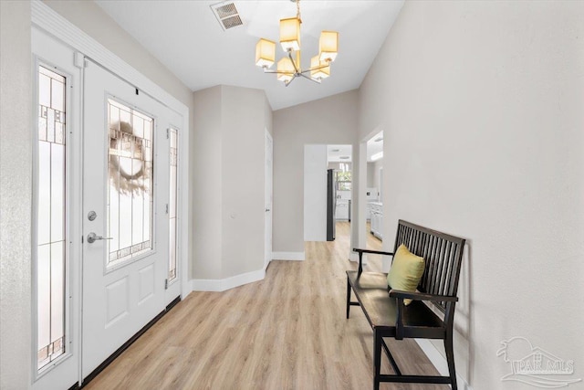 4308 Northpointe Way, Pensacola, FL 32514 - entrance foyer featuring a chandelier, light wood-style floors, and baseboards