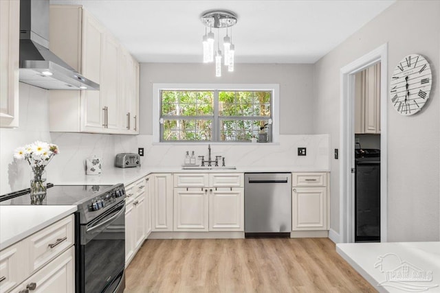 4308 Northpointe Way, Pensacola, FL 32514 - kitchen featuring stainless steel dishwasher, black electric range, wall chimney exhaust hood, a sink, and light wood-style floors