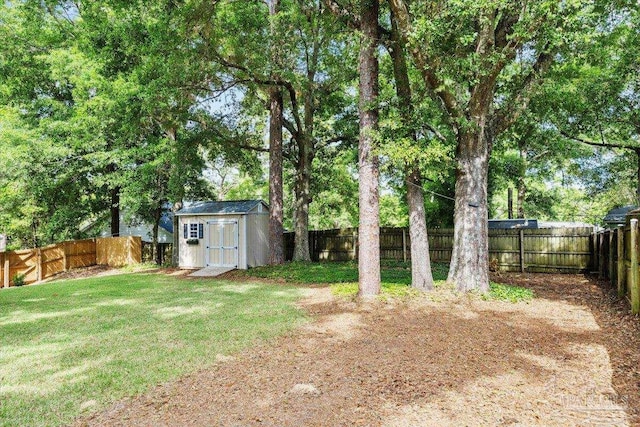 4308 Northpointe Way, Pensacola, FL 32514 - view of yard featuring a storage unit and an outdoor structure