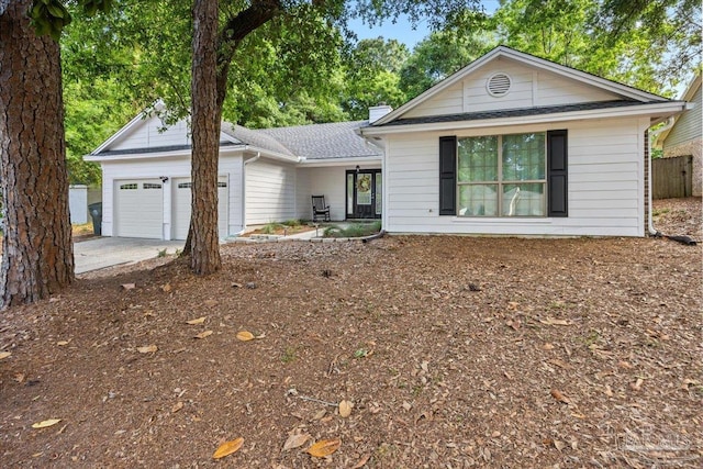 4308 Northpointe Way, Pensacola, FL 32514 - single story home with an attached garage, a chimney, and driveway