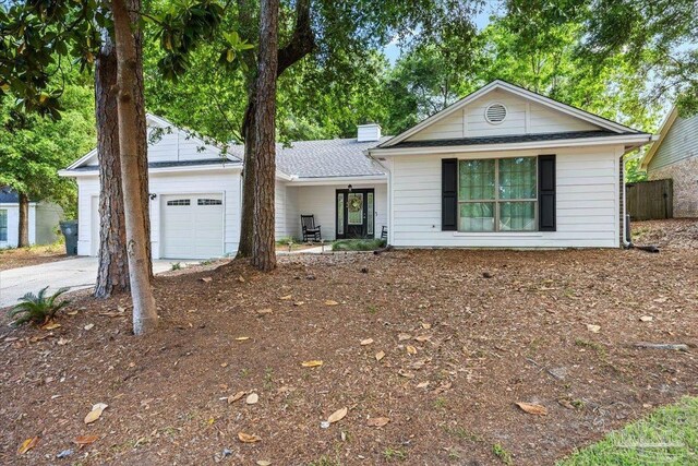 4308 Northpointe Way, Pensacola, FL 32514 - view of front of house with a garage, driveway, and fence