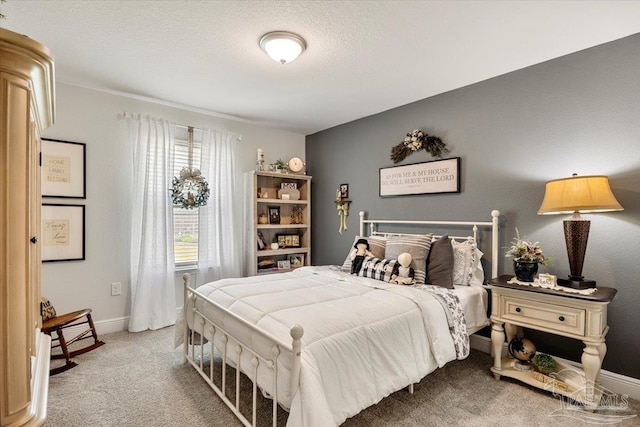 bedroom with carpet and baseboards