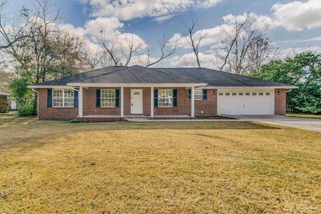 ranch-style home with a garage and a front lawn