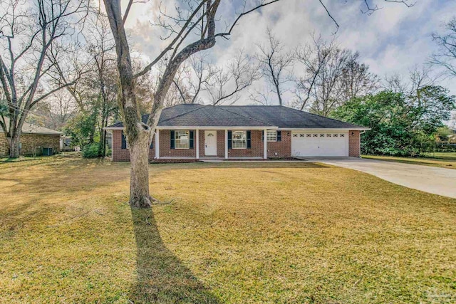 single story home with a garage and a front yard