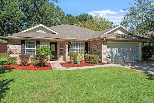 ranch-style house featuring a front yard and a garage