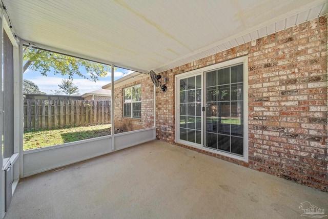 unfurnished sunroom with a healthy amount of sunlight