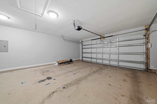 garage featuring electric panel and a garage door opener