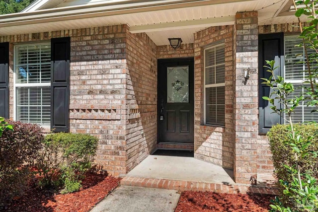 doorway to property featuring a porch