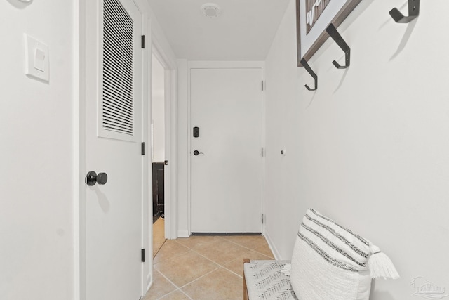 interior space with light tile patterned floors