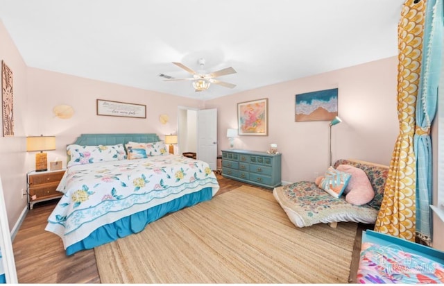 7837 Skyview Blvd, Navarre, FL 32566 - bedroom with wood finished floors and ceiling fan