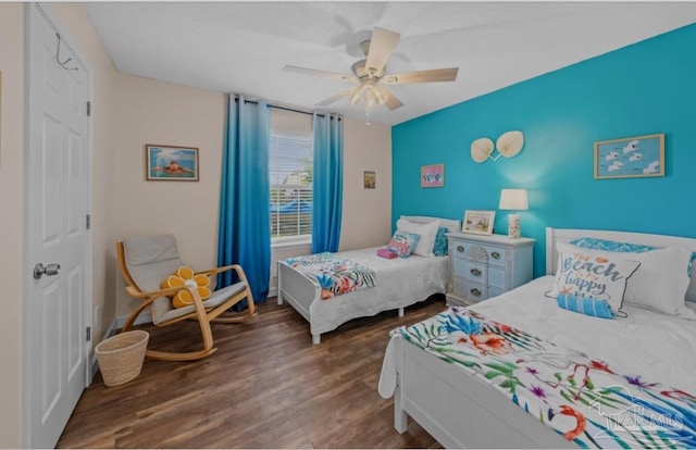 7837 Skyview Blvd, Navarre, FL 32566 - bedroom featuring wood finished floors and ceiling fan