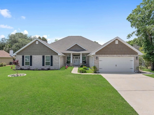 2849 Pga Blvd, Navarre, FL 32566 - craftsman inspired home with a garage, a front yard, driveway, and brick siding