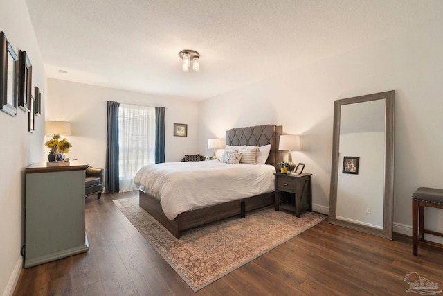 2849 Pga Blvd, Navarre, FL 32566 - bedroom with dark wood finished floors and baseboards