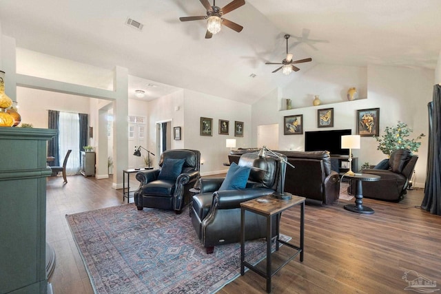 2849 Pga Blvd, Navarre, FL 32566 - living room with a ceiling fan, vaulted ceiling, wood finished floors, and baseboards