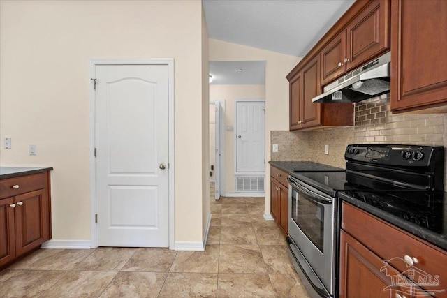 4361 Martha Ct, Gulf Breeze, FL 32562 - kitchen with lofted ceiling, electric stove, tasteful backsplash, light tile patterned floors, and dark stone counters