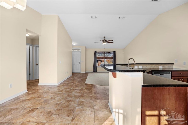 4361 Martha Ct, Gulf Breeze, FL 32562 - kitchen with stainless steel dishwasher, ceiling fan, sink, a kitchen bar, and kitchen peninsula