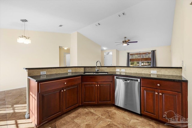 4361 Martha Ct, Gulf Breeze, FL 32562 - kitchen featuring lofted ceiling, hanging light fixtures, sink, dishwasher, and dark stone counters