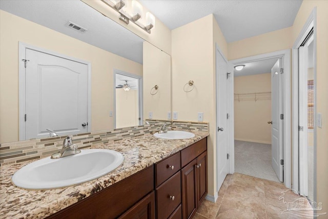 4361 Martha Ct, Gulf Breeze, FL 32562 - bathroom with vanity and decorative backsplash