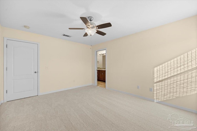 4361 Martha Ct, Gulf Breeze, FL 32562 - unfurnished bedroom featuring light carpet, ensuite bathroom, and ceiling fan