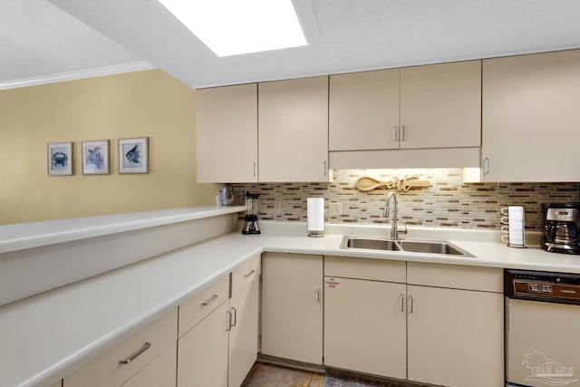 kitchen featuring crown molding, dishwasher, tasteful backsplash, and sink