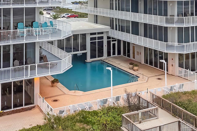 view of swimming pool featuring a patio