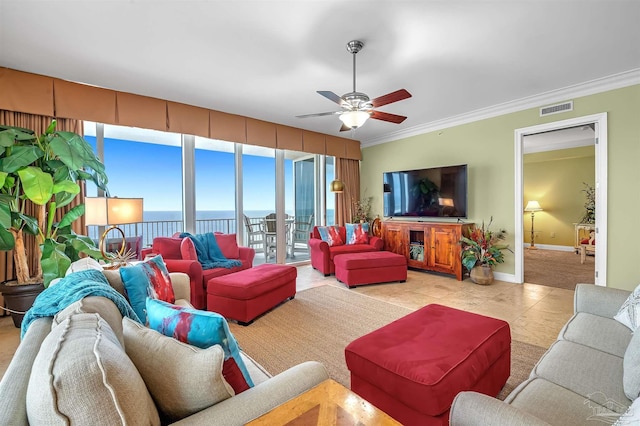 living room featuring crown molding, ceiling fan, and light tile patterned flooring