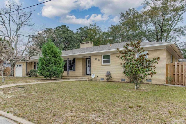 single story home with a garage and a front lawn