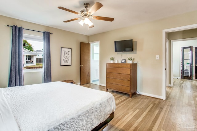 bedroom featuring ceiling fan and light wood-type flooring