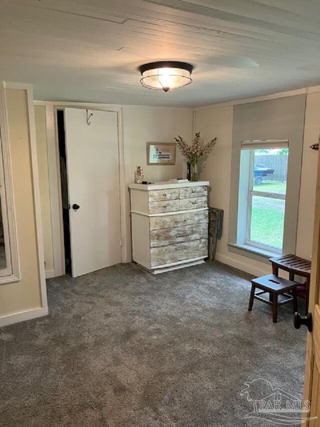 4316 Floridatown Rd, Pace, FL 32571 - carpeted bedroom featuring baseboards and a closet