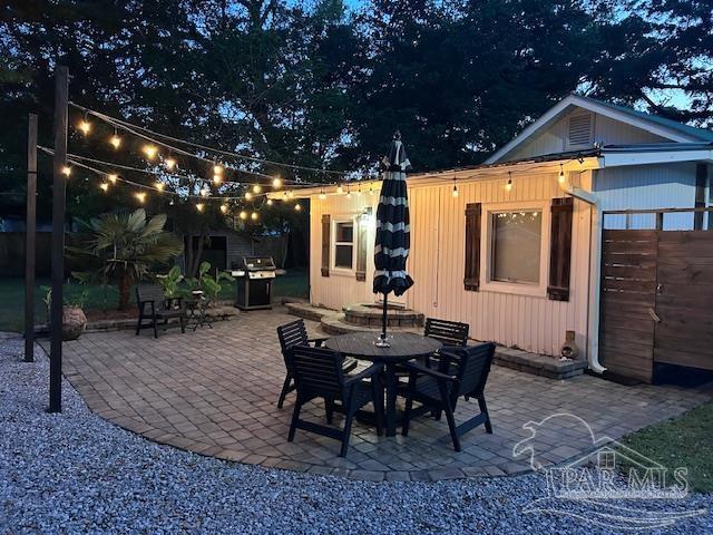 4316 Floridatown Rd, Pace, FL 32571 - view of patio with outdoor dining area and a grill
