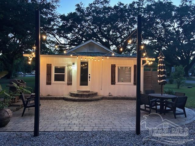 4316 Floridatown Rd, Pace, FL 32571 - back of house with a patio