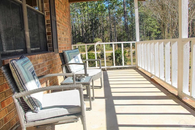 balcony featuring a porch