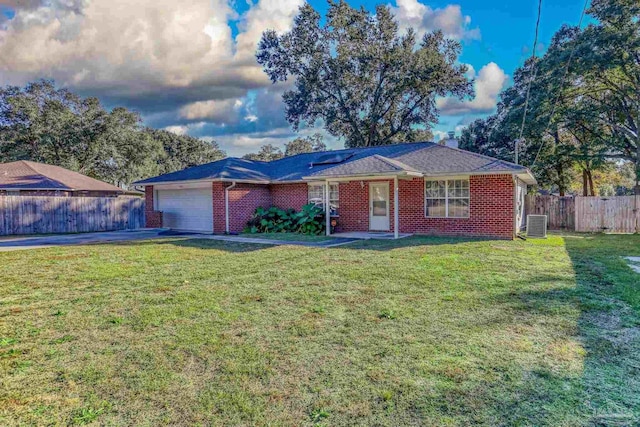 single story home featuring cooling unit, a garage, and a front lawn