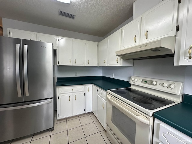 4885 Mayo Cir, Pace, FL 32571 - kitchen featuring freestanding refrigerator, white range with electric stovetop, under cabinet range hood, white cabinets, and dark countertops