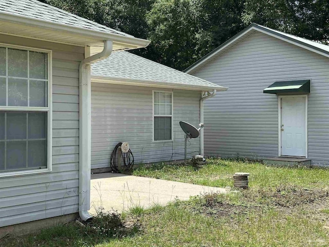 4885 Mayo Cir, Pace, FL 32571 - view of home's exterior with a shingled roof