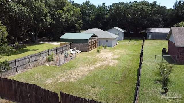 4885 Mayo Cir, Pace, FL 32571 - fenced backyard featuring dirt driveway