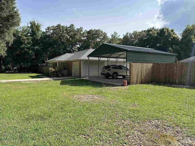 4885 Mayo Cir, Pace, FL 32571 - view of property exterior with a detached carport