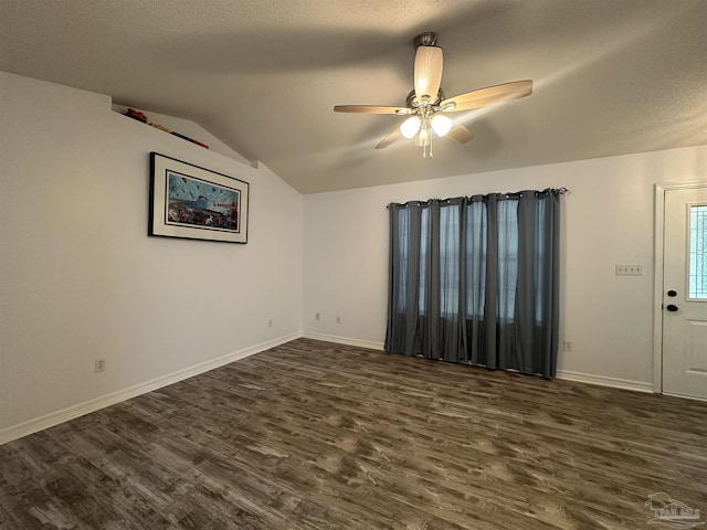 4885 Mayo Cir, Pace, FL 32571 - unfurnished room featuring dark wood finished floors, vaulted ceiling, a ceiling fan, and baseboards