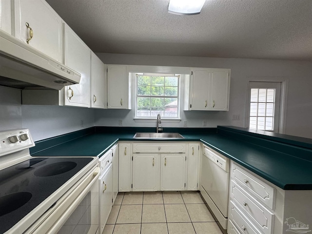 4885 Mayo Cir, Pace, FL 32571 - kitchen with white appliances, a sink, ventilation hood, a textured ceiling, and dark countertops