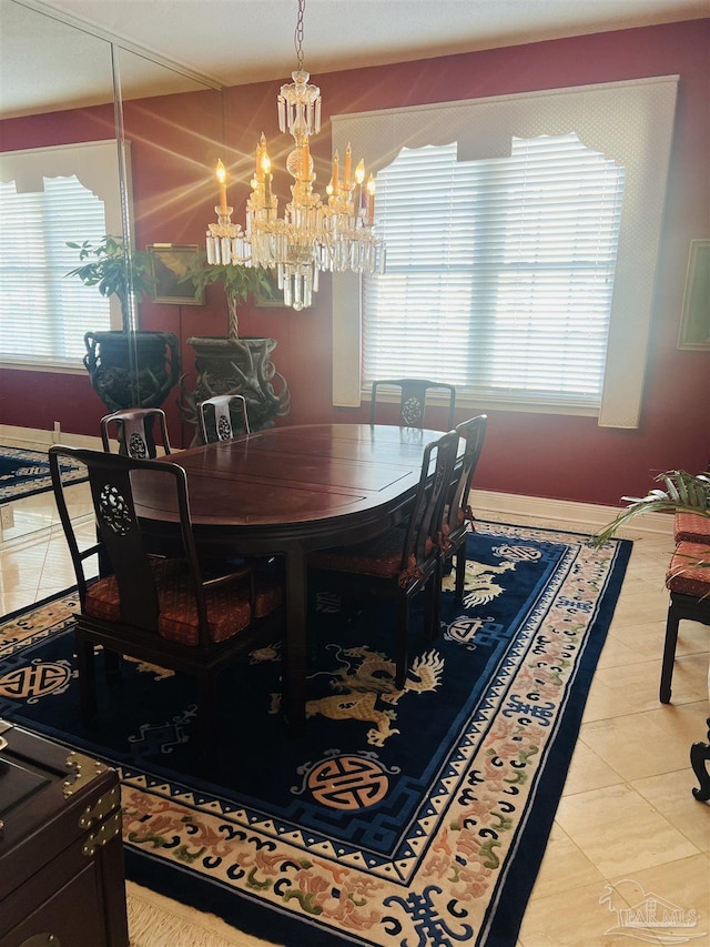 dining space featuring light tile patterned floors