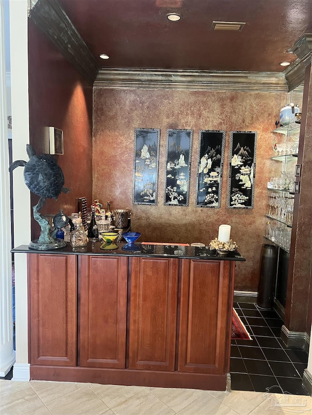 bar with crown molding and tile patterned floors