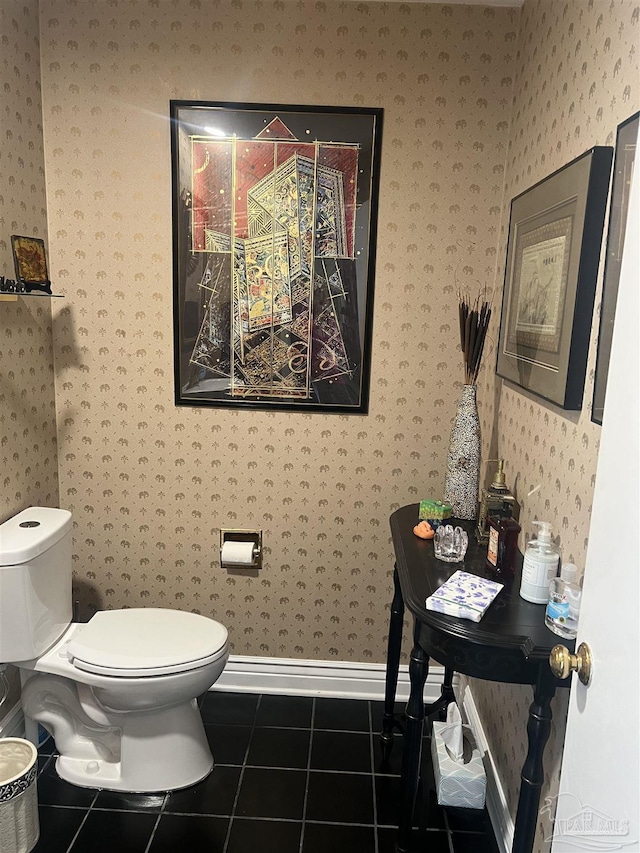 bathroom with tile patterned flooring and toilet