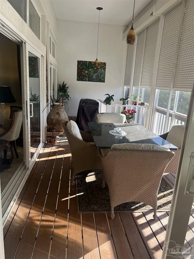 dining area with dark wood-type flooring