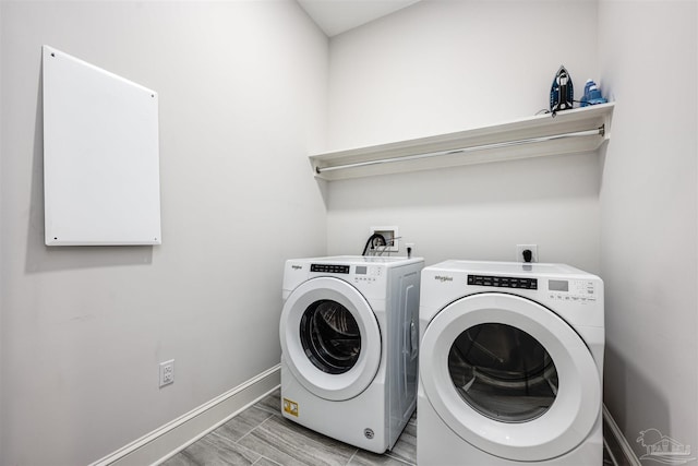 washroom featuring separate washer and dryer