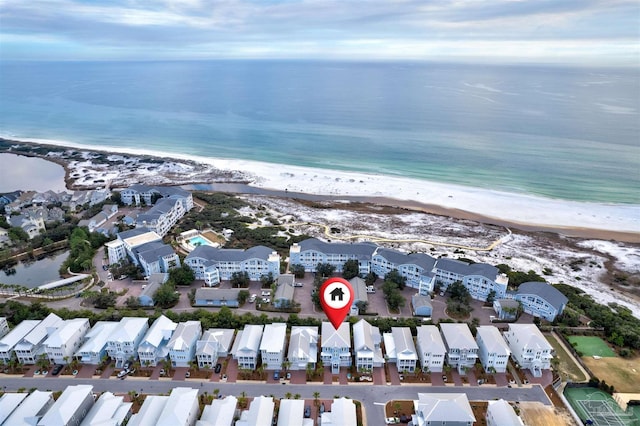 aerial view with a beach view and a water view