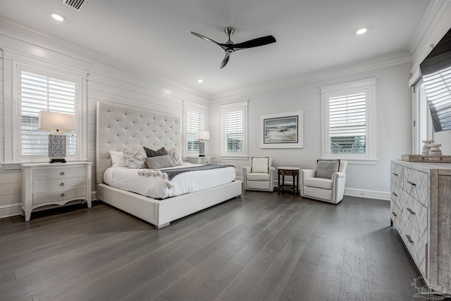 bedroom with ceiling fan, dark hardwood / wood-style flooring, multiple windows, and ornamental molding