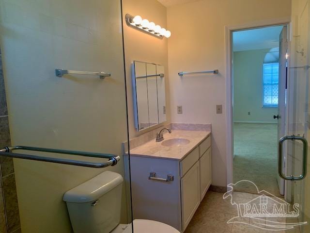 bathroom with vanity and toilet