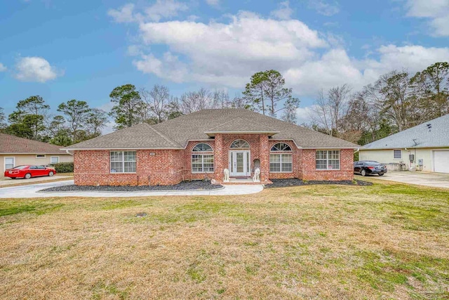 ranch-style house with a front lawn