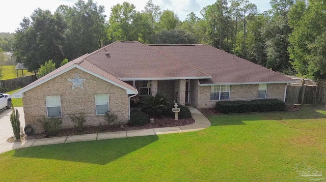 ranch-style house with a front yard